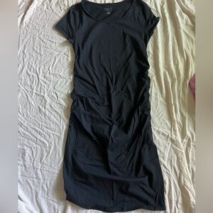 Isabel Maternity form fitting and stretchy black dress. Size medium